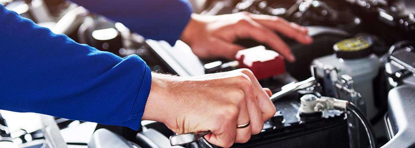 service tech working on battery